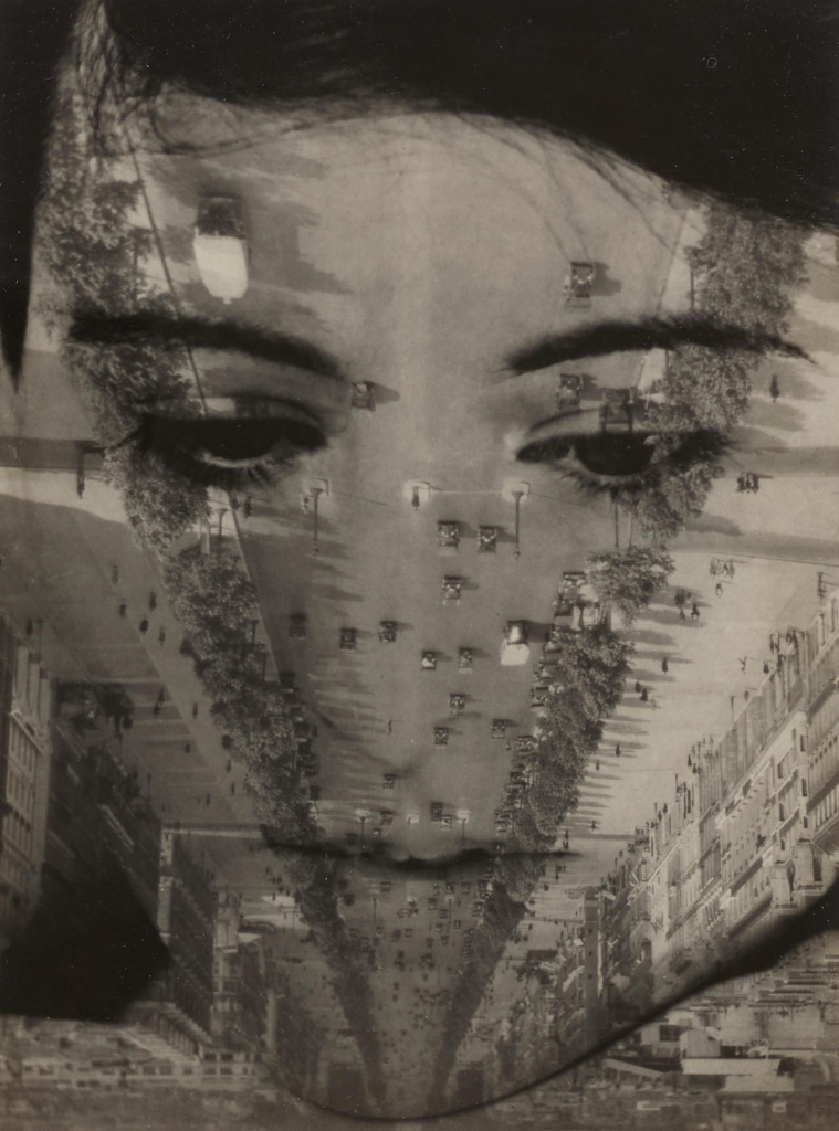 Black and white photo showing a white woman's face with dark hair and eyebrows super-imposed over an upside-down image of a boulevard dotted with people and cars.