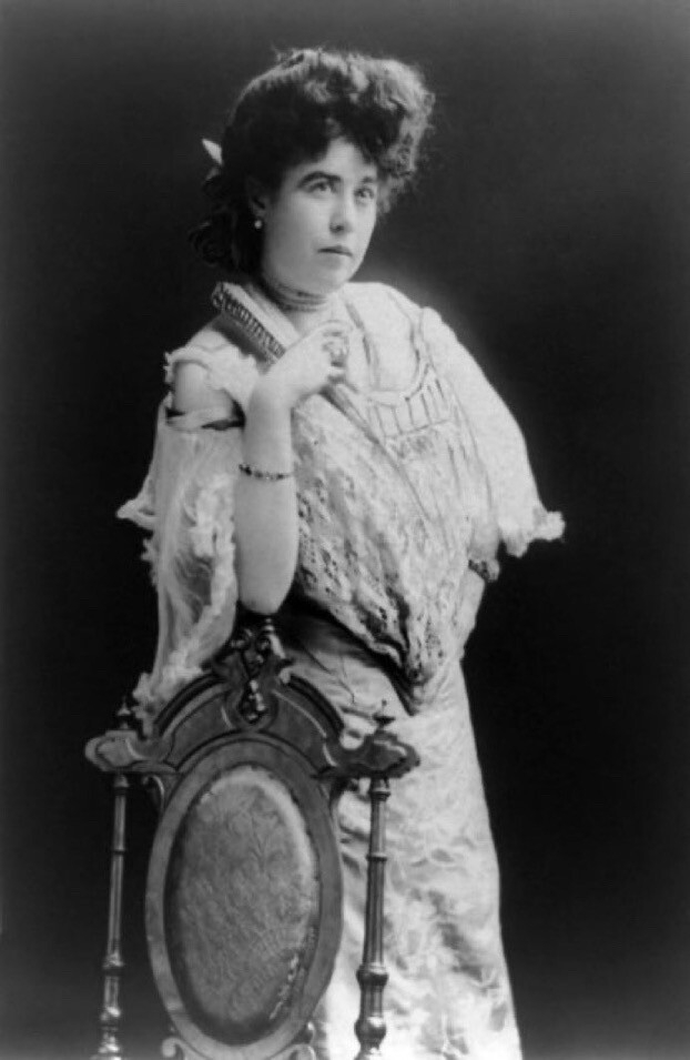 Margaret "Molly" Brown, survivor of the Titanic, three-quarter length portrait, standing, facing right, right arm on back of chair.	

Library of Congress Prints and Photographs Division, George Grantham Bain Collection.