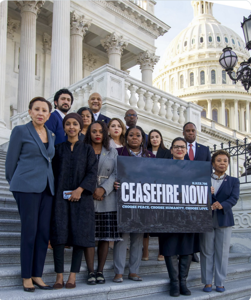 Photo shows congress people who signed on to the #CeasefireNOW proposed bill, with representative Rashida Tlaib, Barbara Lee and Cori Bush holding a sign that says "Ceasefire Now" standing outside of the steps of the capitol.