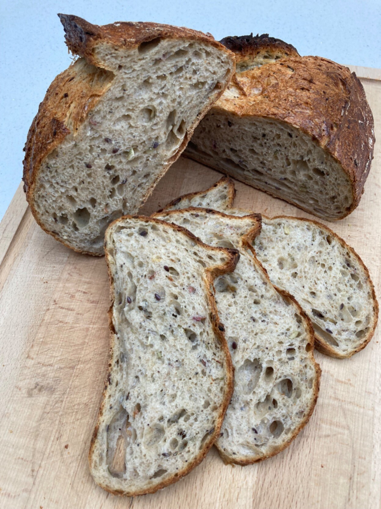 Crumb shots of my multi-seeded sourdough using a rye starter, 8% scalded home milled red Lammas flour, 6% scalded rye, 6% milled mixed pulses, 80% very strong white Canadian flour + chopped rosemary, 60g mixed seed & dried flowers. 
#sourdough #bread #breadposting #flour #milling #canadian #rosemary  #redlammas #rye #pulses #driedflowers