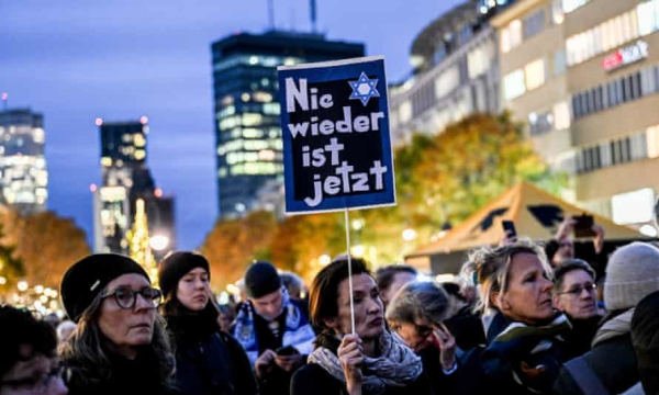 A procession organised by the Jewish Society marks the 85th anniversary of the 1938 Nazi pogrom in Berlin. Photograph: FIlip Singer/EPA