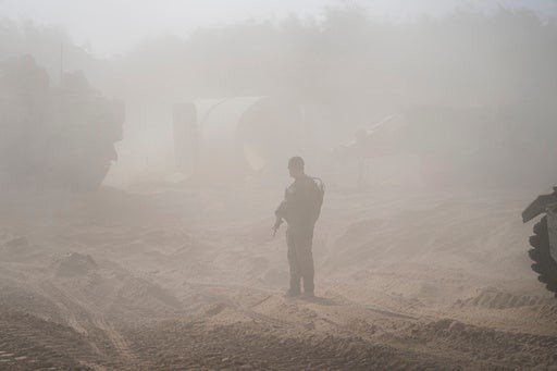 Israeli army troops are seen on the Israeli-Gaza border during a ground operation in the Gaza Strip, Wednesday, November 8, 2023. Israeli ground forces entered the Gaza Strip as they press ahead with their war against Hamas militants in retaliation for the group’s unprecedented October 7 attack on Israel. (AP Photo/Ohad Zwigenberg)