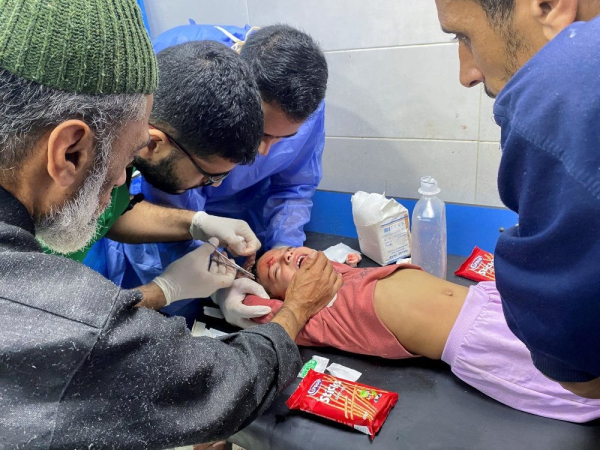 TREATMENT. Palestinian girl Orheen Al-Dayah, who was injured in her forehead in an Israeli strike amid the ongoing conflict between Hamas and Israel, has her wounds stitched without anesthesia, at Al Shifa hospital in Gaza City, November 8, 2023. 