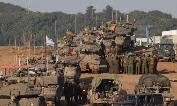 Israeli soldiers near the border with the Gaza Strip on Saturday. Photograph: Atef Safadi/EPA