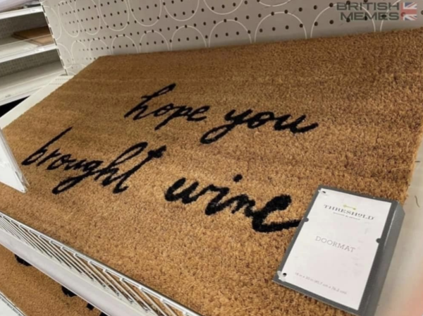 welcome mat for sale that on a store shelf that says:
hope you brought wine (but wine looks quite a bit like the word "urine")