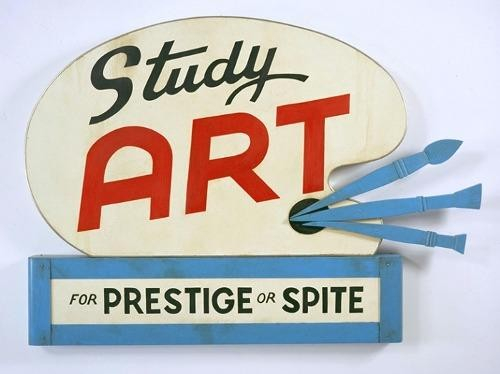 sign in the shape of an artists palette, with brushes on the side, that says: Study Art for prestige or spite