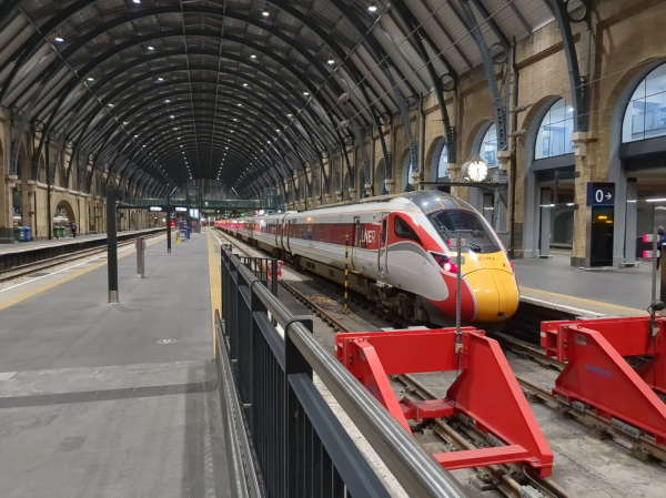 A nice, long, red and white train at Kings Cross, platform 0