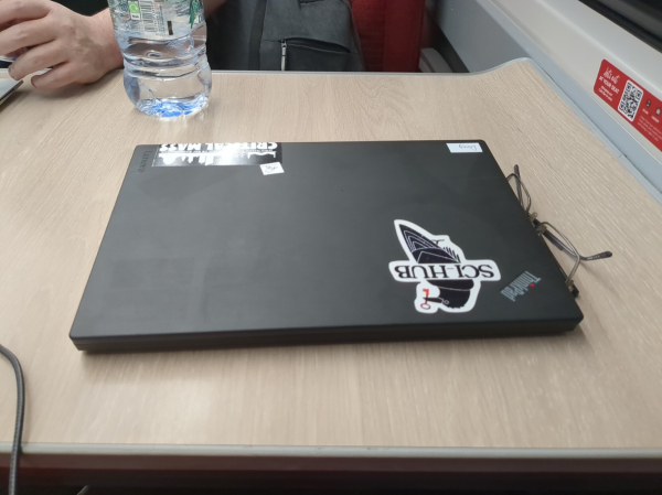 My laptop, for the last time today, placed upon a roomy train table.