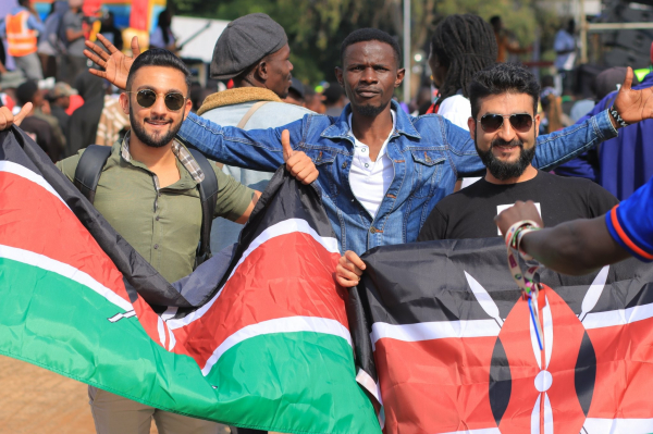 Kenyans displaying flags during concerts to commemorate victims of police brutality 