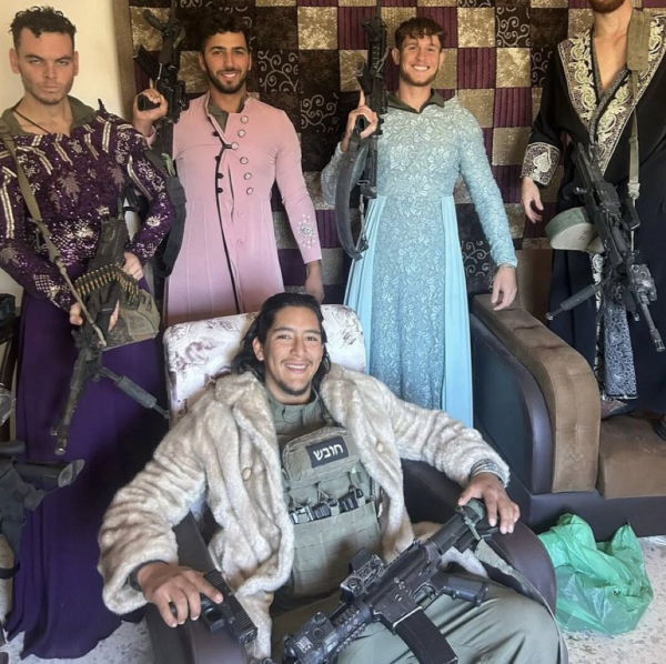 A group of armed IOF soldiers wearing women clothes they stole from some house in south Lebanon.