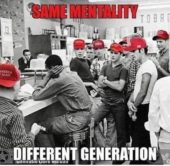 A bunch of young white assholes wearing MAGA hats surround a young black man at a diner counter. They are obviously threatening and taunting him. It is the iconic Sixties pic with the red hats added. Powerful image. 