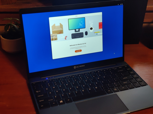 DC-ROMA laptop opened up showing and Ubuntu setup wizard.