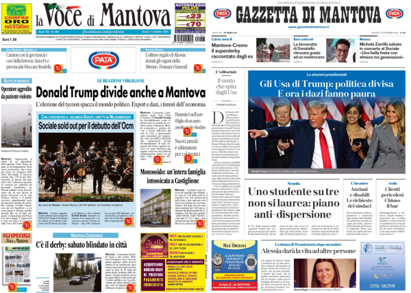 La foto mostra due prime pagine di giornali affiancate. A sinistra c'è "La Voce di Mantova" e a destra "Gazzetta di Mantova".   Sulla prima pagina de "La Voce di Mantova", il titolo principale è "Donald Trump divide anche a Mantova". Sotto il titolo ci sono diverse immagini e articoli, tra cui uno che sembra riguardare un evento sportivo e un altro che parla di una famiglia intervistata a Castiglione.  Sulla prima pagina della "Gazzetta di Mantova", il titolo principale è "Gli Usa di Trump: politica divisa. E ora i dazi fanno paura". C'è una grande foto di Donald Trump con altre persone. Un altro articolo menziona che "Uno studente su tre non si laurea: piano anti-dispersione".  Entrambe le pagine hanno vari altri articoli e immagini più piccoli, ma i dettagli non sono facilmente leggibili.  .