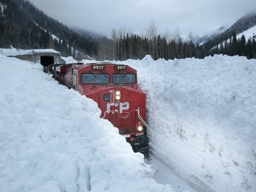 Train goes into deep snow