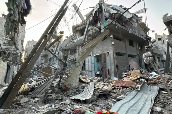 Rubble surrounds a home after it was hit in an Israeli strike on the Jabalia refugee camp in the besieged northern Gaza Strip on Thursday [AFP]