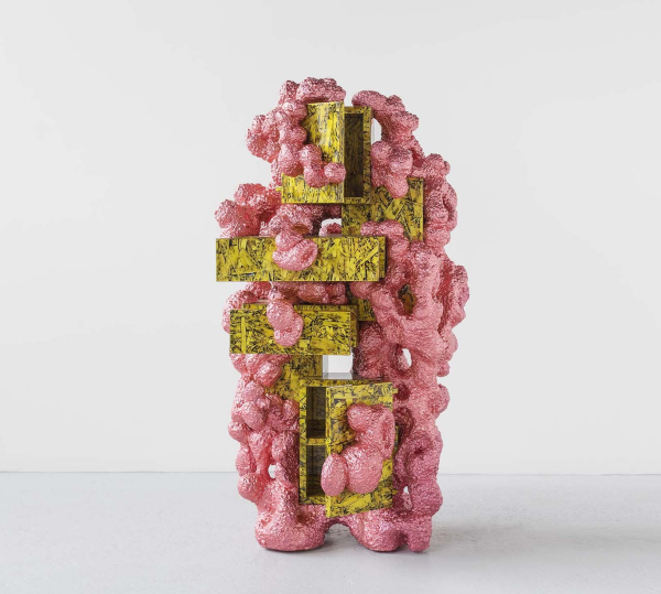 Sculpture of a yellow-green assortment of stacked shelves covered in bright pink puffy organic shapes