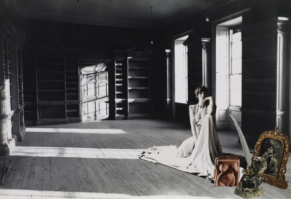 Collage of a large empty grayscale room with a woman kneeling on the wood floor, her head resting on her hand. On the floor in front of her are color images of a torso, an inkwell, and a picture frame.