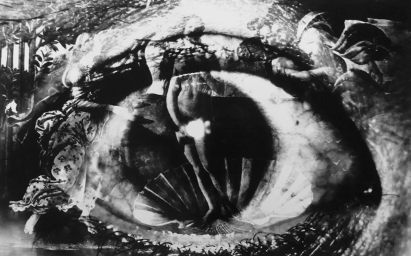 Black and white photo of a series of layered images, with ghostly figures and objects seen over a large eyeball