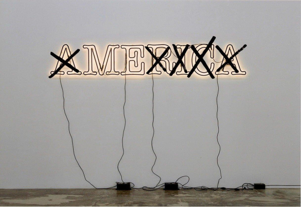 A white neon sign lit up with the text "AMERICA" but the A, R, I, C, and A are all covered with black "X"s so that only "ME" is fully legible