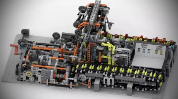 [ImageSource: Bananaman 2018]

The design consisted of an infinitely long tape with symbols that could be moved left and right, a 'head' that could read the symbols and overwrite them with new ones, a finite control that described the machine's state, and a table to link each combination of state and symbol to an instruction for what to do next.

In addition to the constraints of making the device out of Lego, there was also the challenge of fitting into the limits imposed by Lego Ideas. At the time of submission, this was 3,000 parts and The Bananaman's contraption finally managed to come in at around 2,900. The limit has since been raised to 5,000 parts.

Fans of 3D printing will no doubt be pleased to note that some of the parts (notably one of the large gears) came from a printer, but only because buying missing bits online tends to take longer and cost more. A real-world version of the model was designed and built first to make sure it worked. 