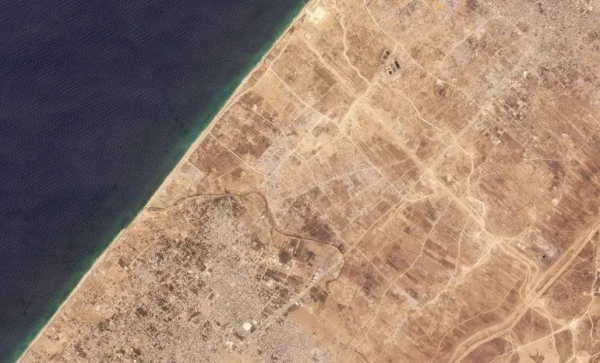 A satellite image shows an area the Israeli military has completely cleared, to dissect the Gaza Strip, and which it has called the ‘Netzarim Corridor’ [Handout:  2024 Planet Labs Inc/via Reuters]