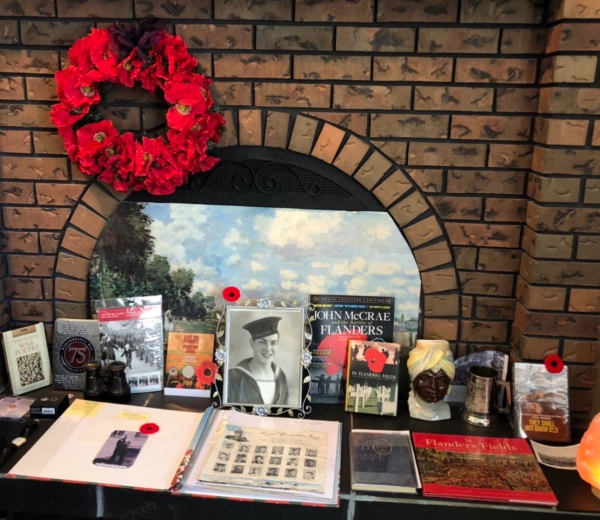 Picture includes poppy wreath and ephemera and photos of BunMum’s  grandfathers in uniform. It has been set up by her Dad last year.