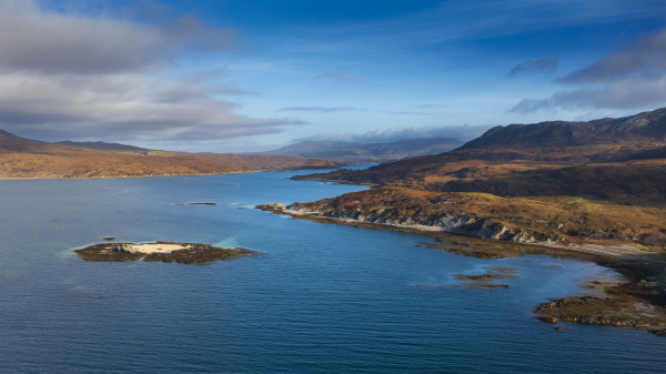 Looking up Loch Eishort from the air towards the small settlement of Heast, Sleat Peninsula, Isle of Skye. 