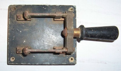 Antique, slightly rusty, knife switch–like the kind you would use to deliver electricity to your monster.