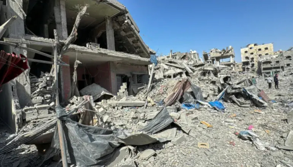 Palestinians view the damage after Israeli forces withdrew from the area around Kamal Adwan hospital in Jabalia refugee camp, in the northern Gaza Strip, on October 26, 2024 [Reuters]