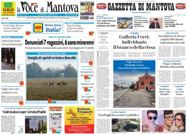 L'immagine mostra due prime pagine di giornali affiancate. A sinistra c'è "La Voce di Mantova" e a destra "Gazzetta di Mantova".   Nella prima pagina de "La Voce di Mantova", il titolo principale è "Denunciati 7 ragazzi, 6 sono minorenni", con un sottotitolo che parla di un episodio di bullismo. C'è anche una foto di una famiglia di caprioli avvistata a Buscoldo. Altri articoli menzionano Virgilio d'Oro e il mondo di Pradello.  Nella prima pagina della "Gazzetta di Mantova", il titolo principale riguarda la "Galleria Ferri: individuato il branco della rissa". Un altro articolo parla di strade in crescita ma con un passo indietro. Ci sono anche riferimenti a un video di un'auto in fiamme e a un'iniziativa per addestrare i docenti.   Entrambe le pagine contengono vari annunci pubblicitari e altre notizie locali.  .