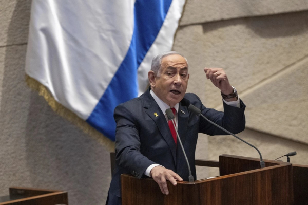 Israel’s Prime Minister Benjamin Netanyahu addresses lawmakers in the Knesset, Israel’s parliament, in Jerusalem. Monday Nov. 18, 2024. (AP)