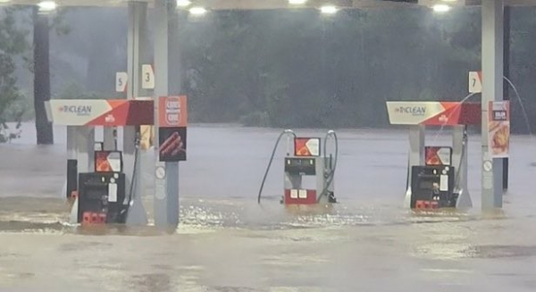 gas station underwater due to flooding and possibly climate change