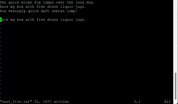 A screenshot of a text editor displaying a file with lines of text, including "The quick brown fox jumps over the lazy dog." The text is shown in a terminal interface, with a highlighted line indicating the current cursor position.