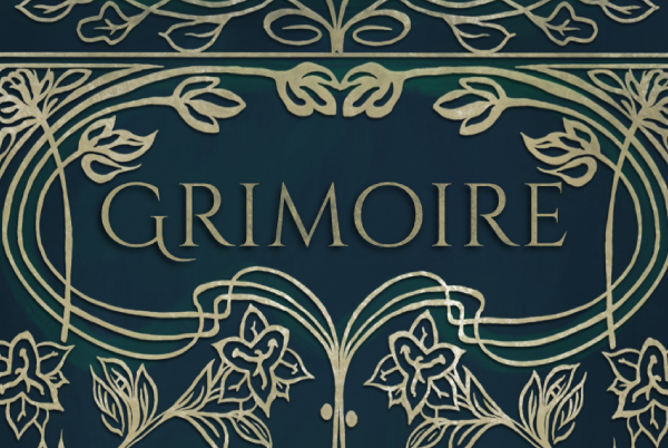 Close up of the title. Grimoire decorated with line drawings of plants and flowers. 