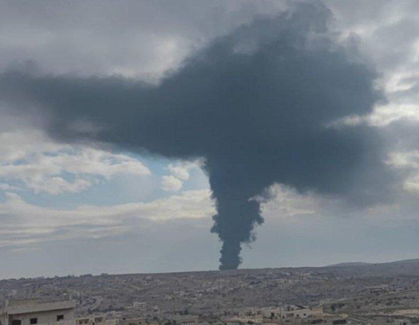 Smoke rises from an attack by anti-Assad forces on regime positions in western Aleppo Province, Syria, November 27, 2024