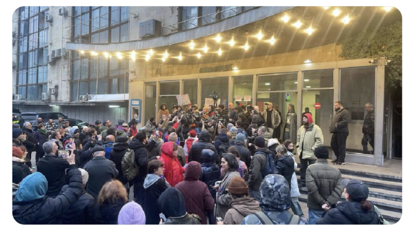 People demonstrating outside Public TV, the public broadcaster in Tbilisi, Georgia.