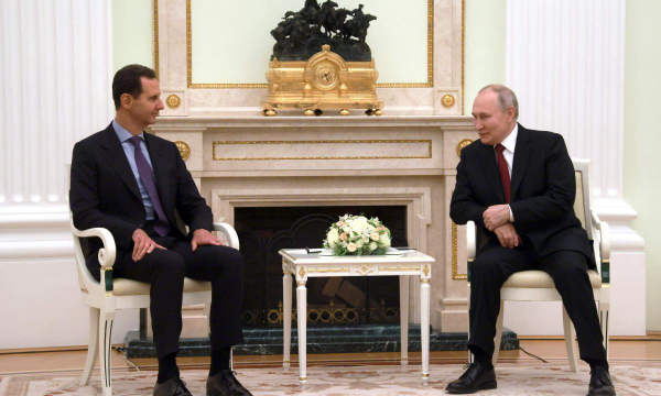 El presidente sirio, Baschar  Al Assad, y su homólogo ruso, Vladímir Putin; en una imagen de archivo de un encuentro en el Kremlin. (VLADIMIR GERDO/SPUTNIK/AFP via Getty Images)