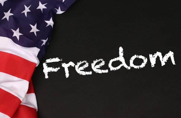 Part of a US flag and the word Freedom

Image Source: https://foto.wuestenigel.com/wp-content/uploads/api/american-flag-with-the-text-freedom-against-a-blackboard-background.jpeg 