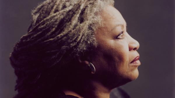 Toni Morrison in profile. She is a Black woman with greying locs