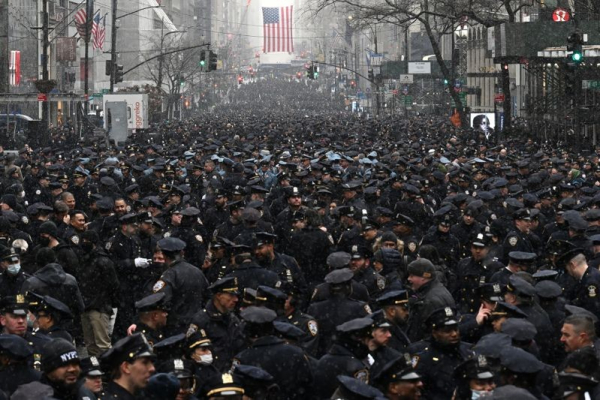 A large crowd of tens of thousands of NYPD cops.