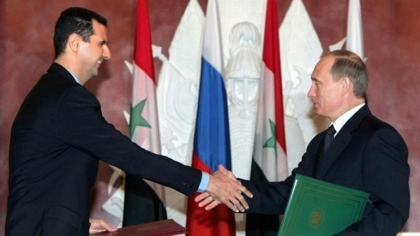 Bashar Al-Assad amb Vladímir Putin en una imatge del 2005 (EFE/EPA/Sergei Chirikol)