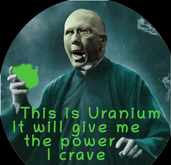 A picture of Dutton holding a lump of radioactive uranium. Words are this is uranium. It will give me the power I crave.