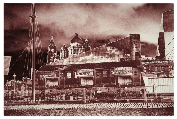 Colour adjusted reddish brown photograph showing historical dockside buildings in Liverpool.