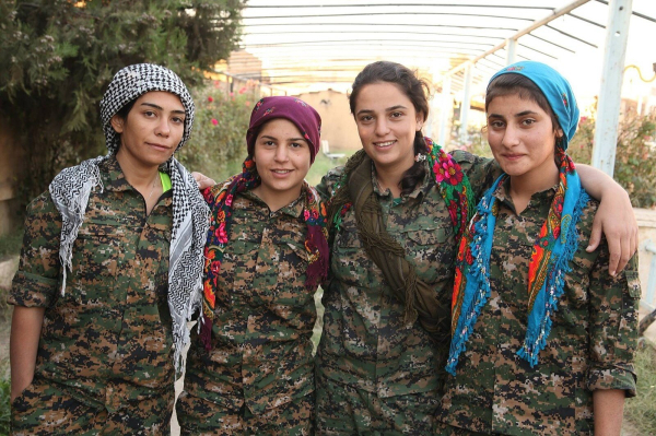 YPJ members in a greenhouse farm, for ecological cooperative farming https://en.m.wikipedia.org/wiki/Autonomous_Administration_of_North_and_East_Syria