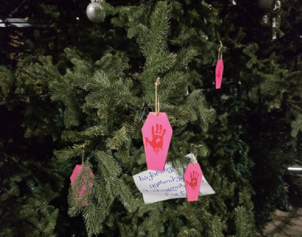 Tbilisi Christmas tree decorated with pink coffins.