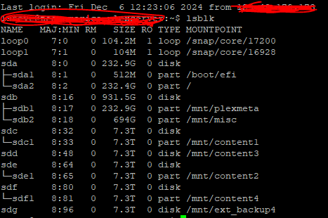 "Terminal screenshot showing the output of the lsblk command in Linux, listing block devices and their details such as name, size, type, and mount points. Multiple devices, including loop devices, partitions, and mounted drives, are displayed."