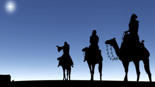 silhouette of the three wise men following the star of bethlehem