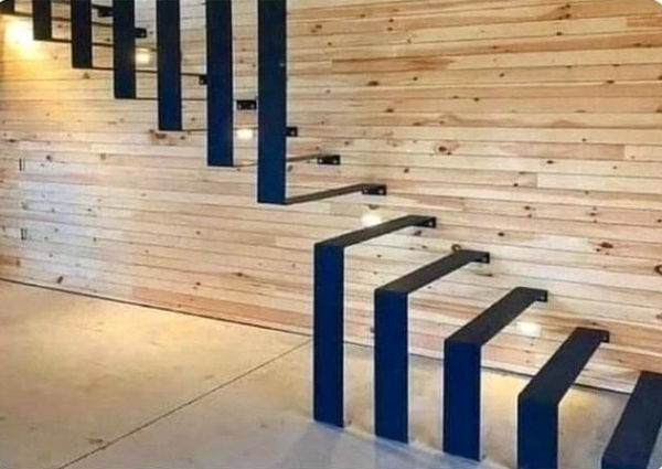 A staircase designed so that you walk down the actual recessed steps with air between each step, making it quite dangerous if you're not careful.