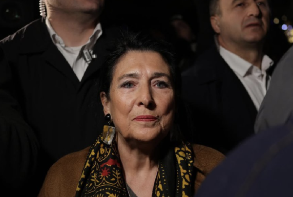 Shot of a very determined looking Salome Zourabichvilli attending a mass demonstration in Tbilisi, Georgia.