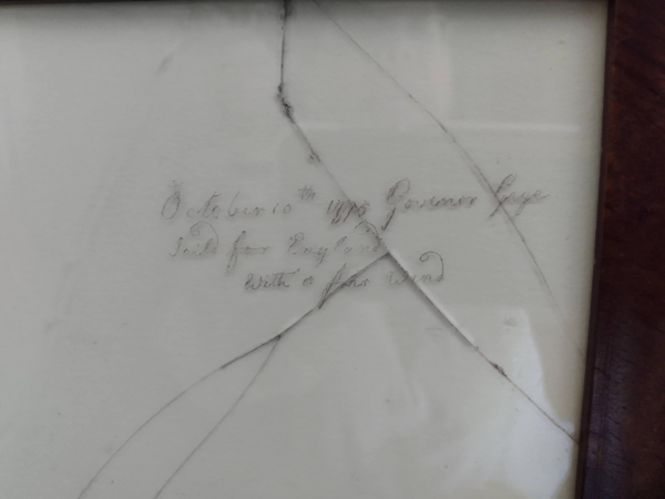 From the window of his house, reportedly Josiah Quincy could see Boston Harbor activity. On his window he scratched: 

"October 10th 1776 Governor Gage Sails for England 
with a fair wind" in curvy script

The window pane is cracked now, and set into a frame inside the house. But on the tour they describe him watching the harbor from his cupola room and writing this there. 